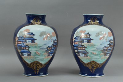 Lot 506 - A pair of Far Eastern baluster porcelain vases