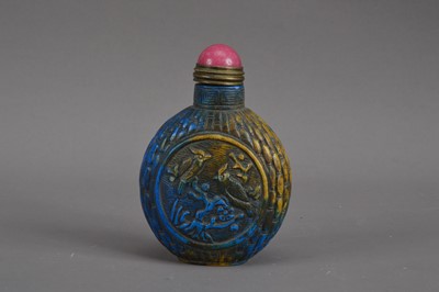 Lot 520 - A Chinese carved resin and hardstone snuff bottle