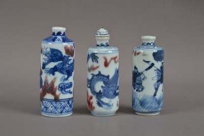 Lot 521 - A collection of three Chinese hand painted porcelain scent bottles