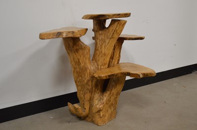 Lot 529 - A naturalistic four tier wooden occasional table