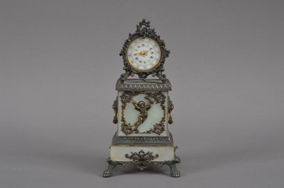 Lot 539 - A 19th century Continental travelling mother-of-pearl and brass clock
