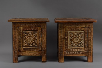 Lot 541 - A pair of 20th century Indian hardwood carved small tables