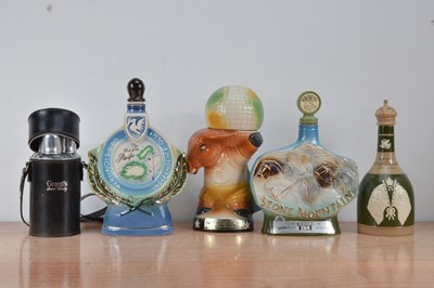 Lot 697 - A collection of assorted empty Novelty decanters