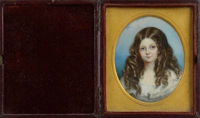 Lot 792 - A late 19th century portrait miniature on ivory of a girl