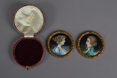 Lot 810 - Two late 19th or early 20th century copper enamelled portrait miniatures