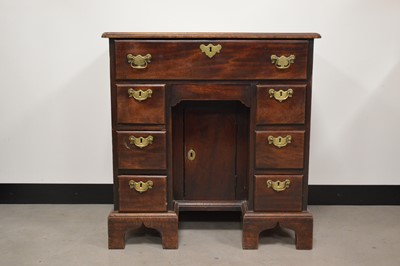 Lot 820 - A 19th century mahogany kneehole desk