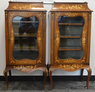 Lot 834 - A pair of early 20th century continental mahogany display cabinets