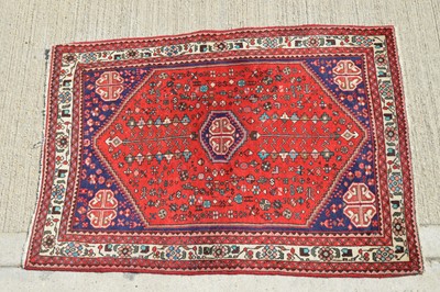 Lot 852 - A Wool and cotton middle eastern rug