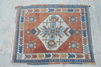 Lot 855 - A woollen Caucasian style rug