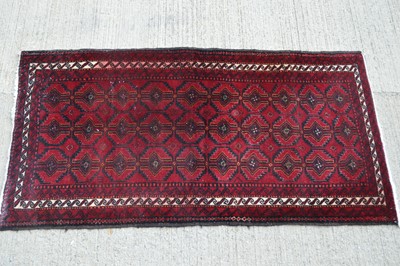 Lot 857 - A 20th century Middle Eastern wide runner
