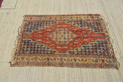 Lot 862 - A middle Eastern flat weave rug