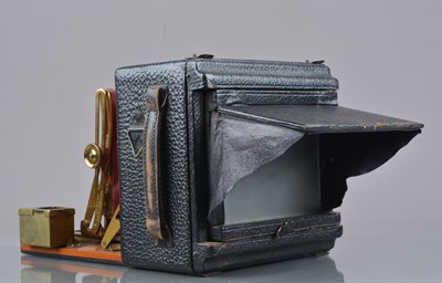 Lot 93 - An early 20th Century Houghton Quarter Plate 'The "Sanderson" Hand Camera Patent'