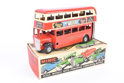 Lot 668 - A Tri-ang Minic 60M clockwork red and cream Double Deck Bus