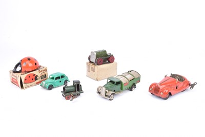 Lot 669 - Tri-ang Minic clockwork Vehicles and Ladybird and Schuco Car and small Clockwork loco