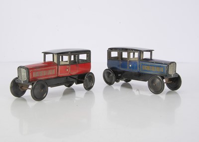 Lot 673 - Wells Tinplate Clockwork Saloon Cars