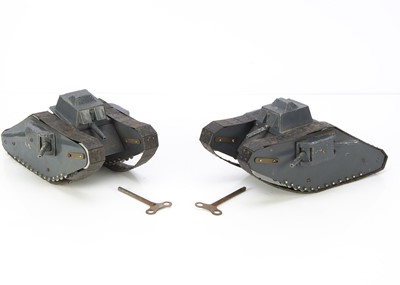 Lot 679 - A pair of  clockwork metal WW1 Female Mk 1V Crawler Tanks probably retailed by Beddington Liddiatt & Co 