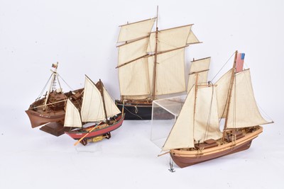 Lot 779 - Three model kit built wood construction Sailing Boats and a Fishing Trawler Boat