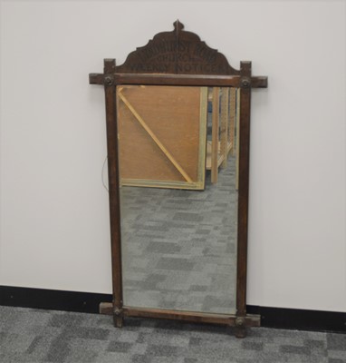 Lot 205 - An early 20th century pitch pie framed mirror