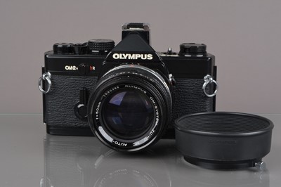 Lot 163 - An Olympus OM-2n MD SLR Camera