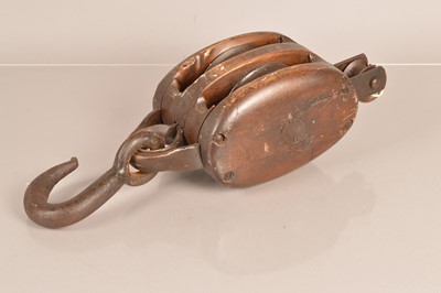 Lot 231 - A vintage wooden pulley