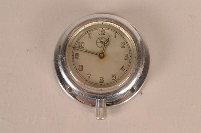 Lot 240 - A chromed car clock