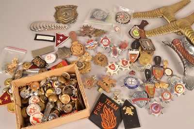 Lot 248 - A collection of British and Overseas Fire Brigade badges and buttons
