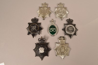 Lot 259 - A collection of seven police helmet plates