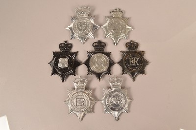 Lot 260 - A collection of seven police helmet plates