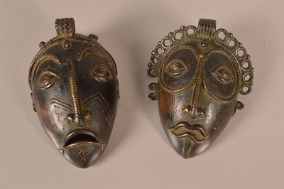 Lot 351 - Two Benin style bronzed masks