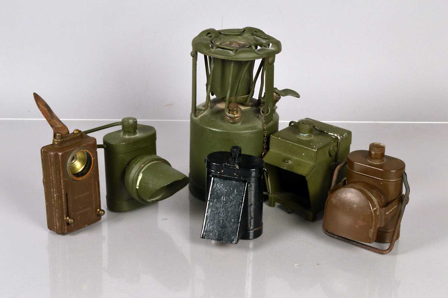 Lot 421 - An assortment of Military Black Out Lamps