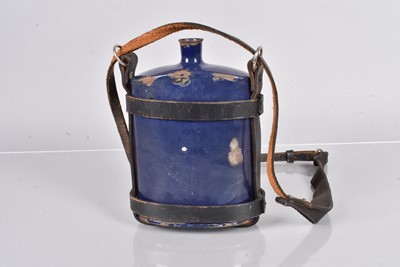 Lot 457 - A War period blue water bottle with strap