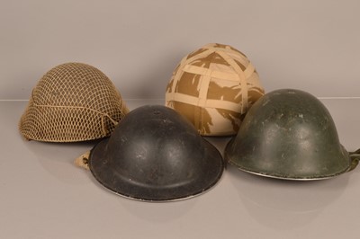 Lot 523 - Four Military helmets