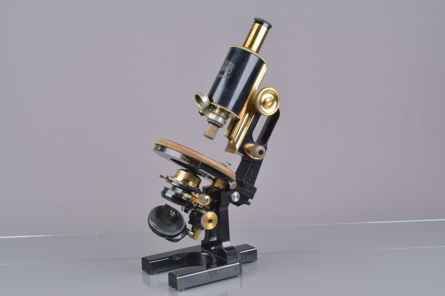 Lot 18 - A mid 20th Century lacquered and black-lacquered brass Carl Zeiss Jug-Handle Compound Monocular Microscope