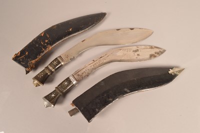Lot 734 - Two Middle Eastern Kukri knives