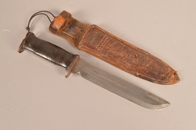 Lot 754 - A WWII US Combat knife by E.G.W