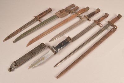 Lot 777 - An assortment of various World Bayonets