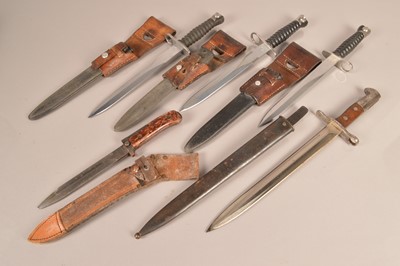 Lot 779 - Three Swiss Sig bayonets