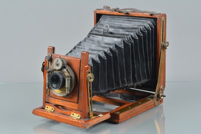 Lot 76 - A Mahogany & Brass Quarter Plate Camera