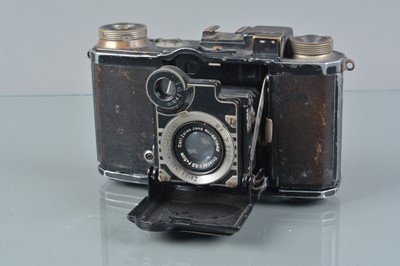 Lot 101 - A Zeiss Ikon Super Nettel Rangefinder Folding Camera