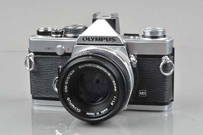Lot 297 - An Olympus OM-2 SLR Camera