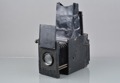 Lot 385 - An Adams Minex De Luxe Reflex Camera