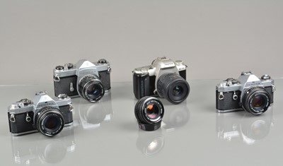 Lot 412 - Four Pentax SLR Cameras