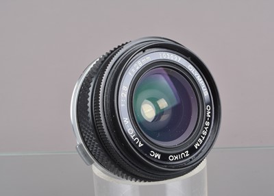 Lot 394 - An Olympus OM Zuiko 28mm f/2.8 Lens