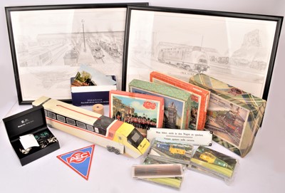 Lot 524 - Engravings Cigarette cards Jigsaws and other Railway themed items