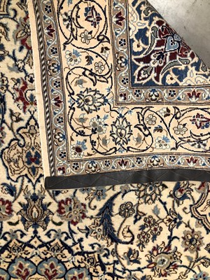 Lot 1 - A Persian woollen rug