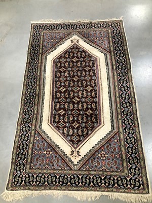 Lot 2 - A Middle Eastern woollen rug