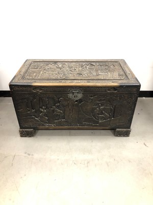 Lot 18 - A 20th century carved Chinese camphor chest