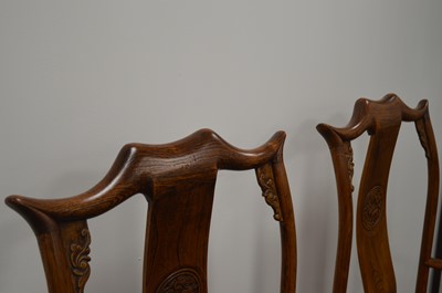 Lot 19 - A pair of impressive Chinese hardwood marriage armchairs