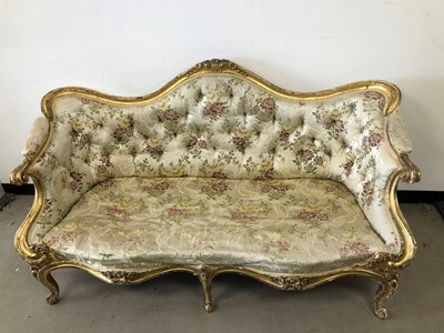 Lot 32 - A French giltwood settee