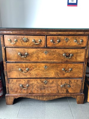 Lot 39 - A Georgian and later walnut chest of drawers
